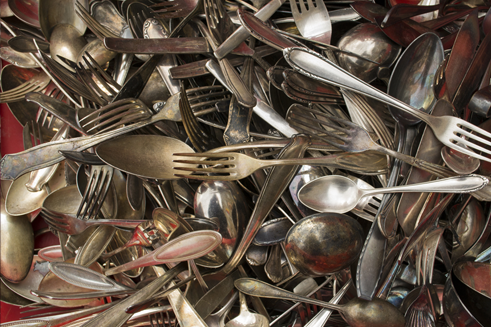 A shot of various sterling silverware utensils - sterling silver flatware