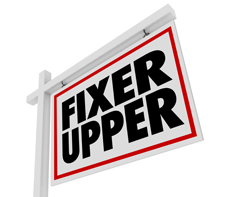 A house sale sign that says 'fixer upper' - what we pawn